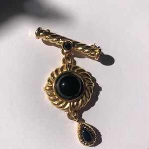 gold and black pin!